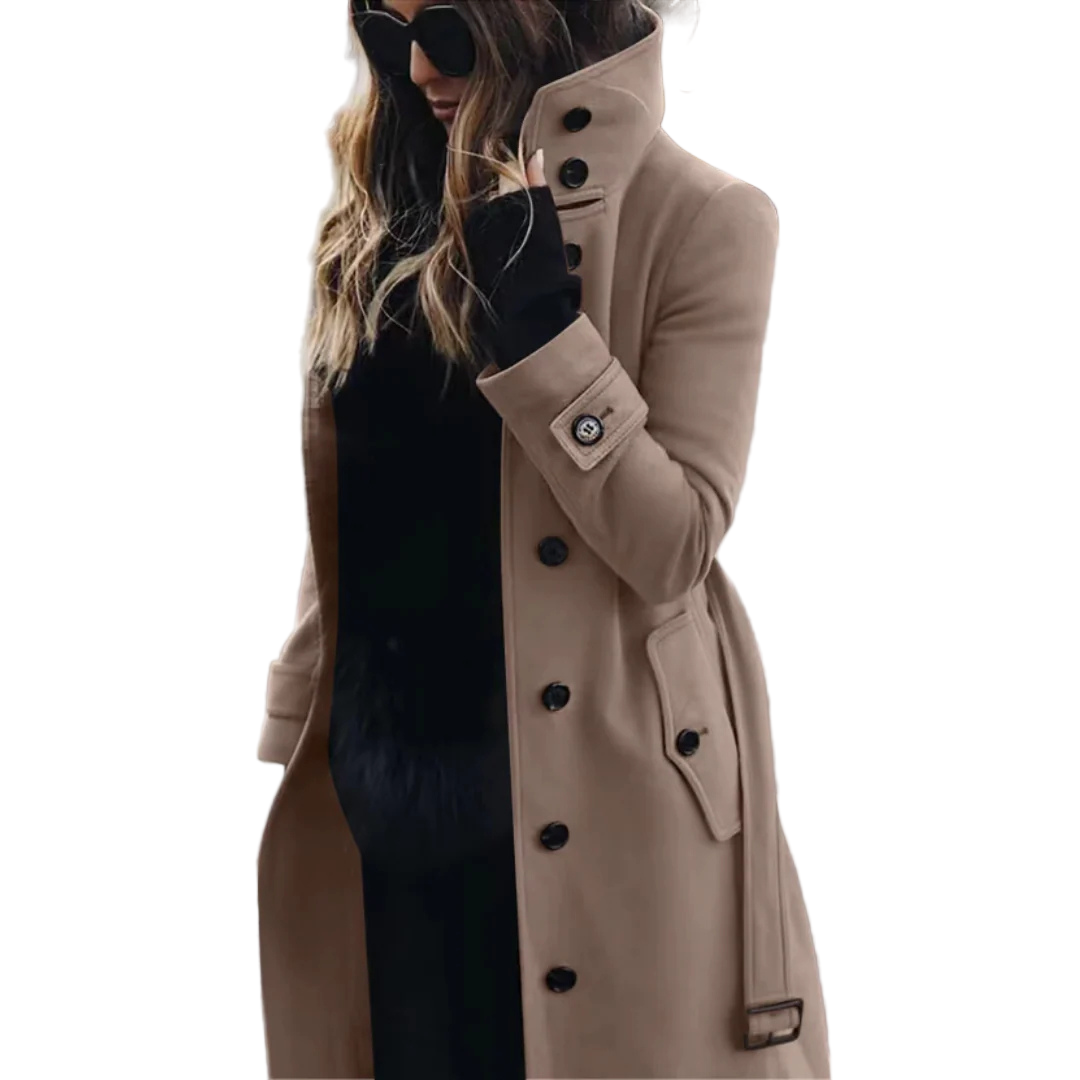 Woman wearing a beige trench coat on a city street.