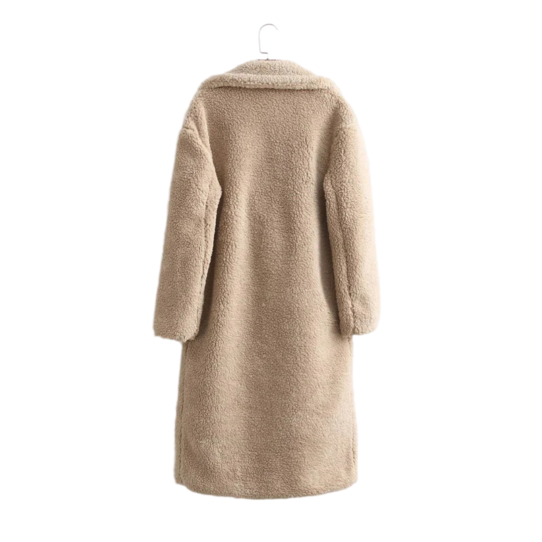 Beige coat on a hanger against a white background
