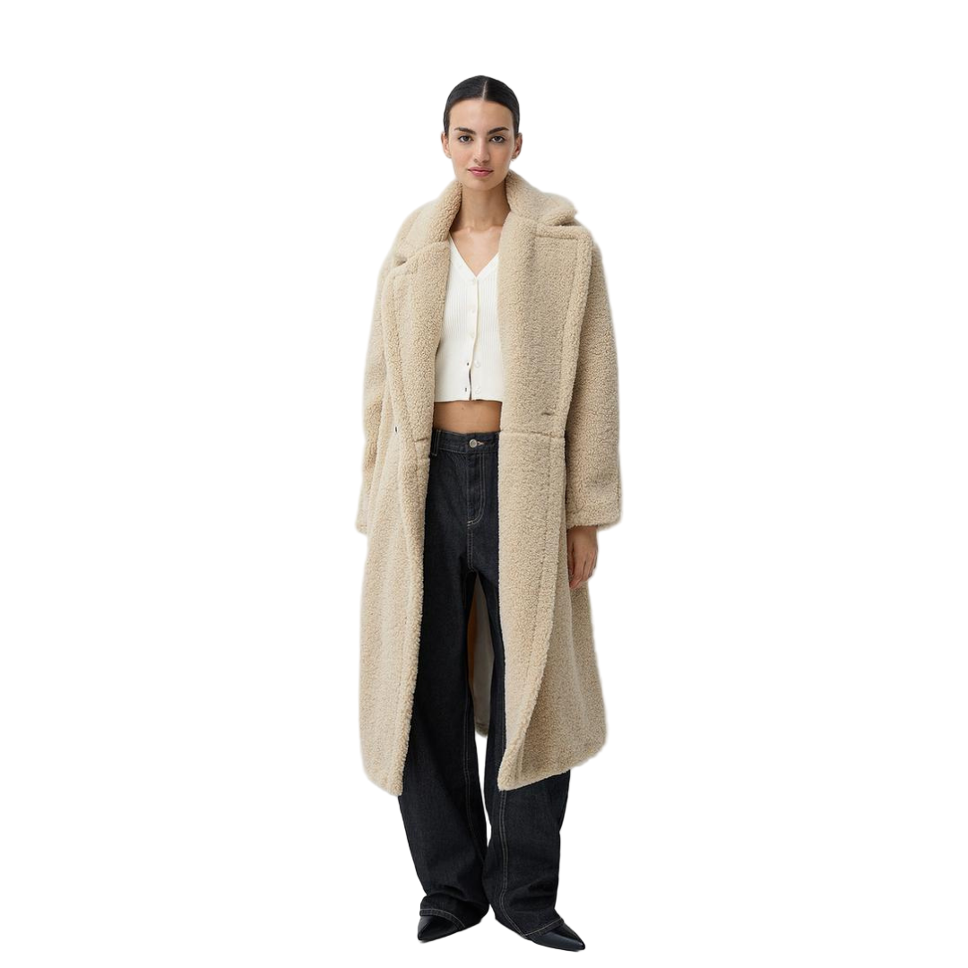 Woman wearing a beige coat on a white background