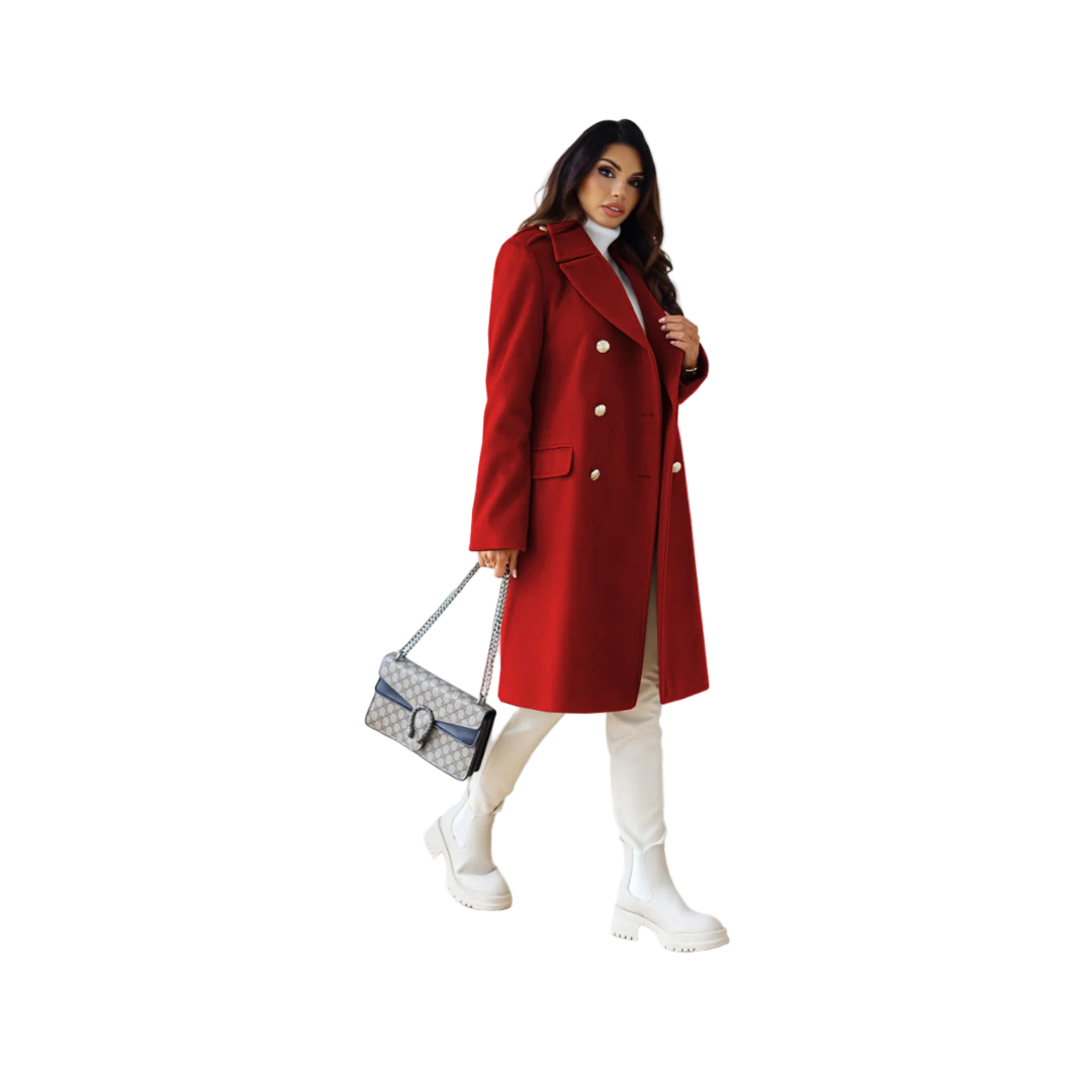 Woman wearing a red coat in a modern interior setting