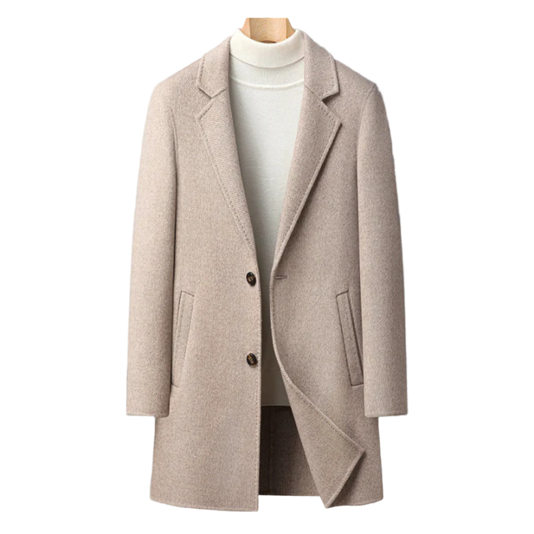 Beige overcoat on a mannequin against a gray background