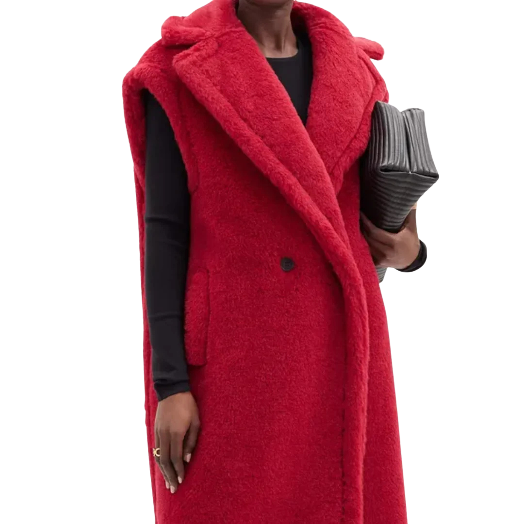 Red coat worn by a person on a white background